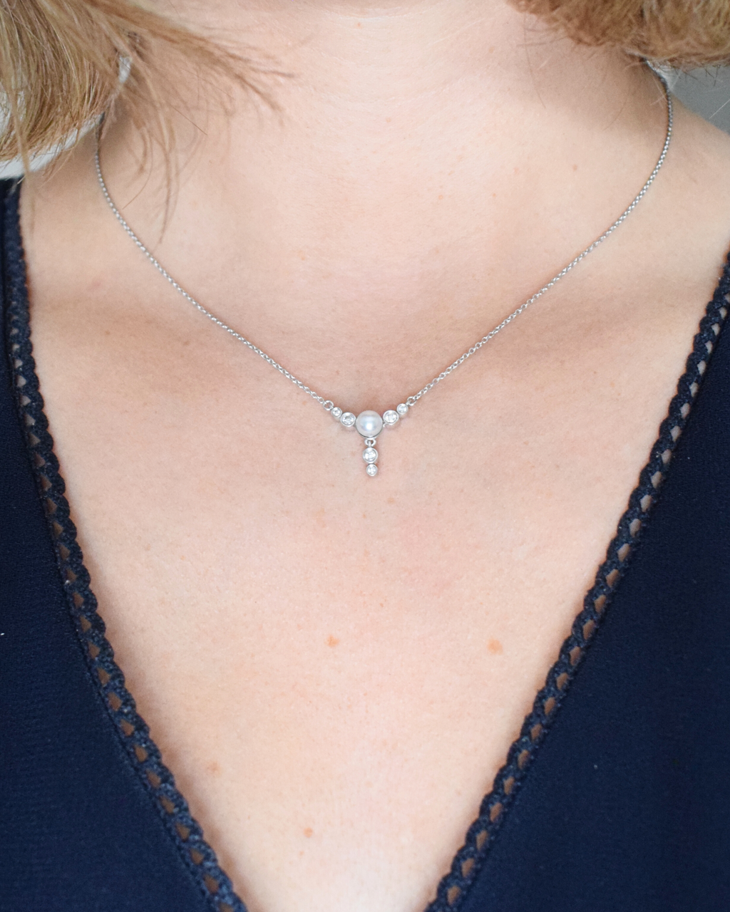 Akoya pearl and white diamond pendant neck shot