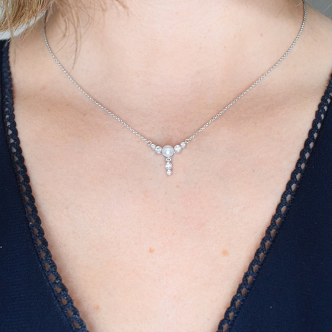 Akoya pearl and white diamond pendant neck shot