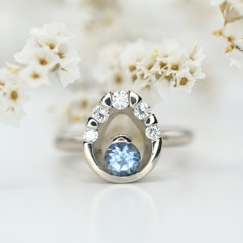 aquamarine and diamond halo ring