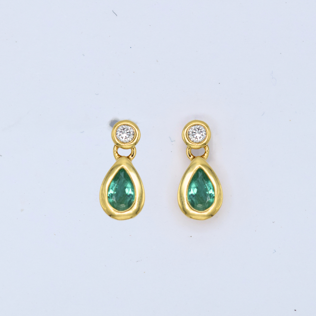 bezel set pear cut emeralds and rbc diamond drop earrings
