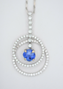 cushion cut royal blue sapphire and double halo of diamonds necklace