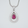 dancing pear ruby with diamond set halo necklace
