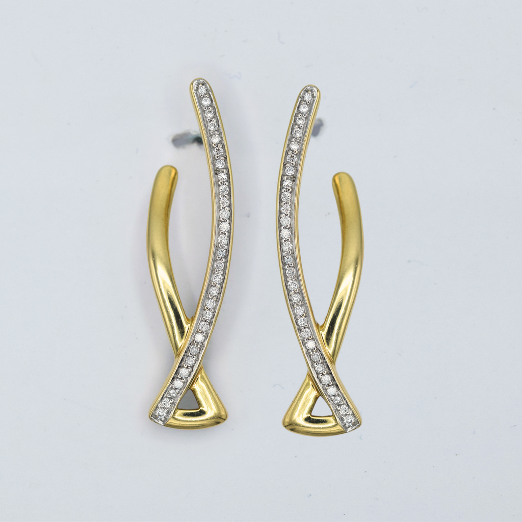 diamond set crossover gold earrings