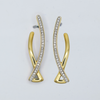 diamond set crossover gold earrings