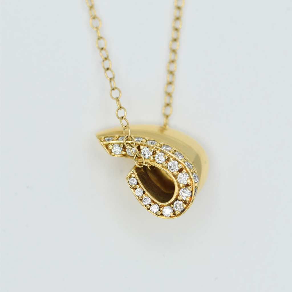 diamond set solid 18k yellow gold curled pendant side