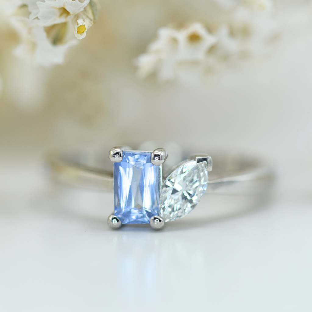 emerald cut lilac sapphire and marquise cut white diamond toi et moi ring