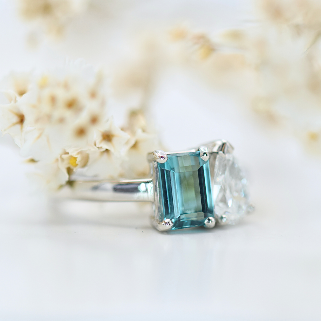 emerald cut teal tourmaline and white diamond toi et moi ring