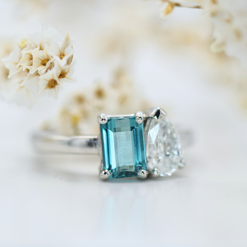 emerald cut teal tourmaline and white diamond toi et moi ring