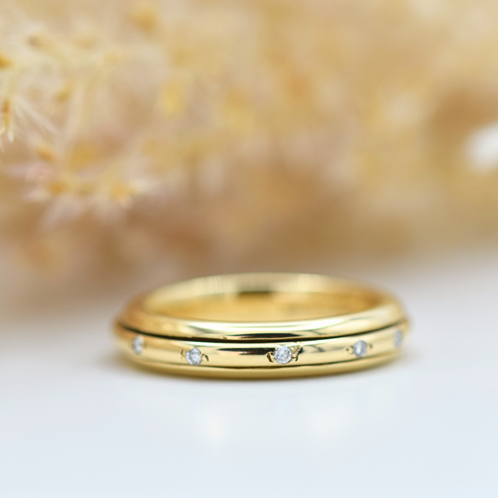 gold diamond set fidget ring