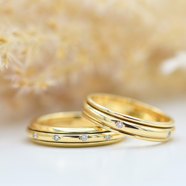 gold diamond set fidget ring both styles