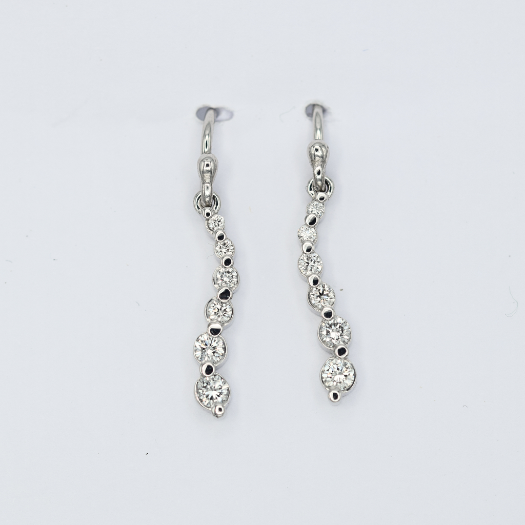 graduated rbc white diamond curve earrings