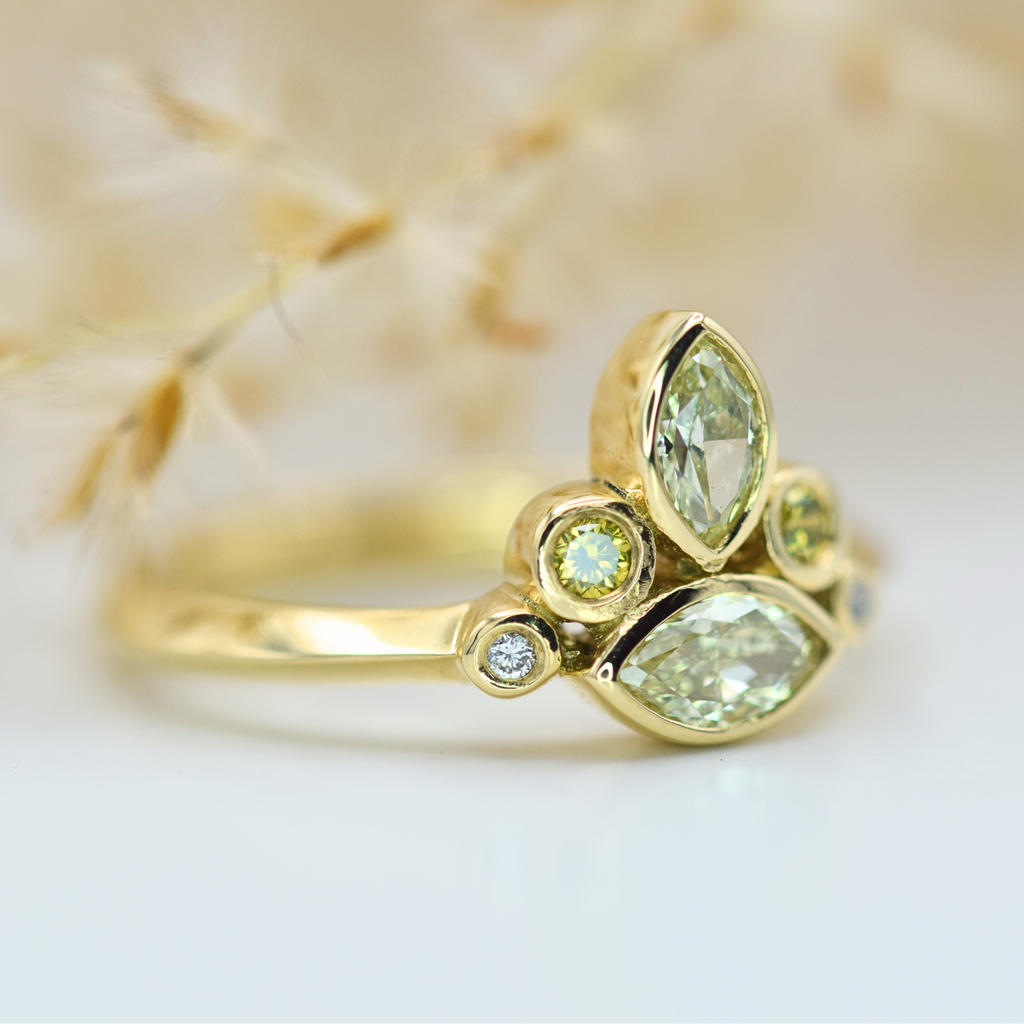 marquise and round yellow diamond cluster yellow gold ring