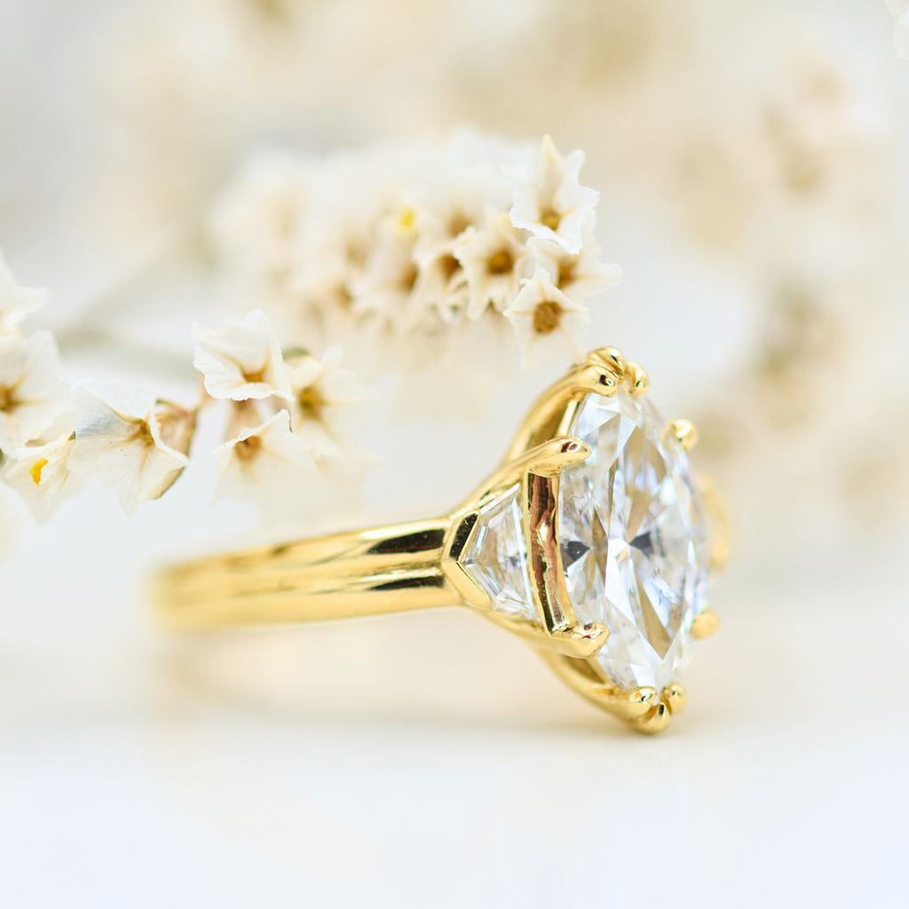 marquise diamond with cadillac diamond side stones 18k yellow gold chunky ring side
