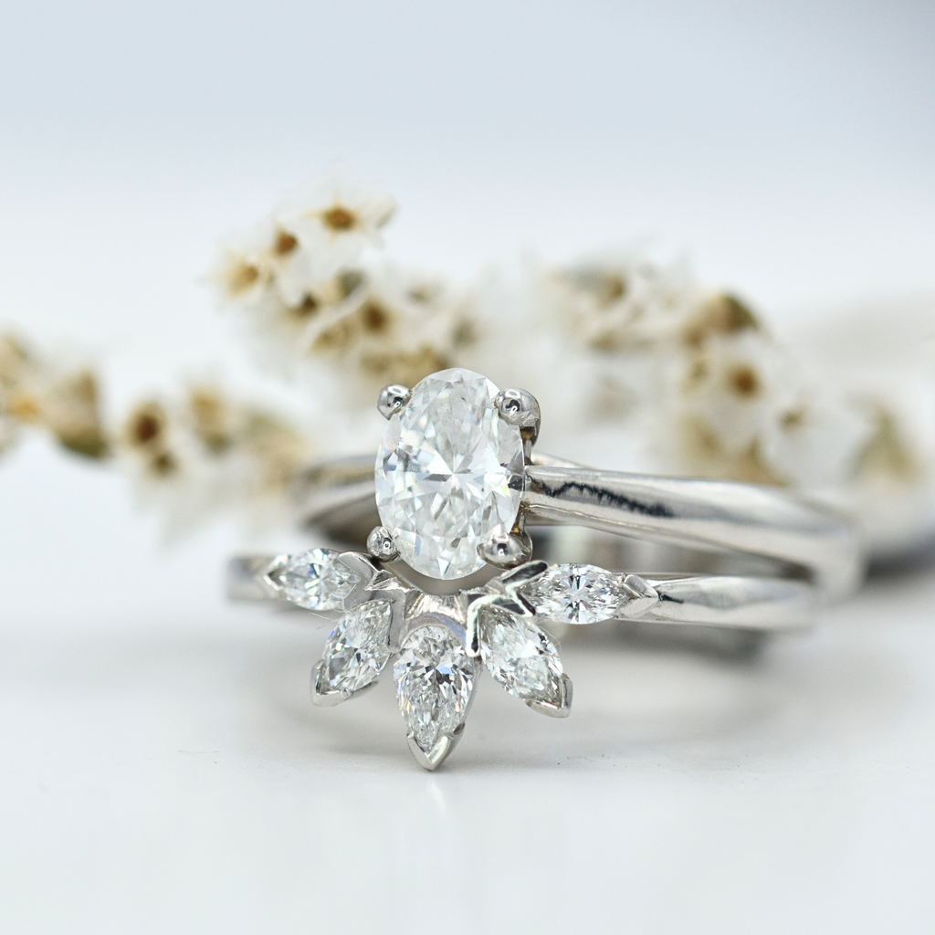 oval diamond solitaire with pear and marquise diamond fan tiara ring