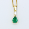 pear_cut_zambian_emerald_with_marquise_white_diamond_pendant_in_yellow_gold