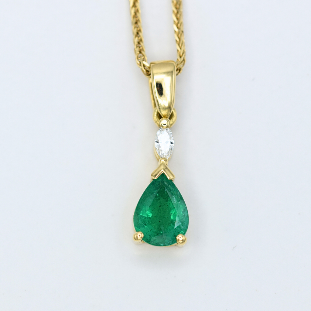 pear_cut_zambian_emerald_with_marquise_white_diamond_pendant_in_yellow_gold