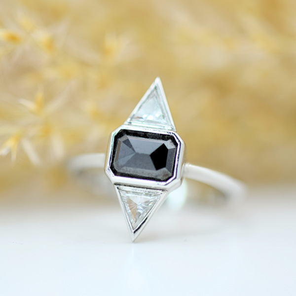 platinum black diamond and trillion white diamond three stone ring
