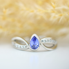 platinum pear cut tanzanite and double twist band with diamonds