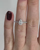 white_gold_pear_diamond_halo_ring_with_diamond_set_shoulders