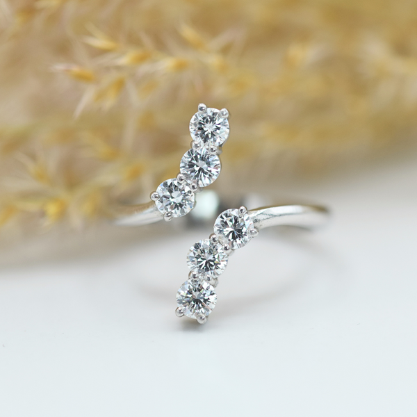 white gold diamond crossover ring