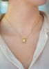 yellow-gold-and-diamond-curved-pendant