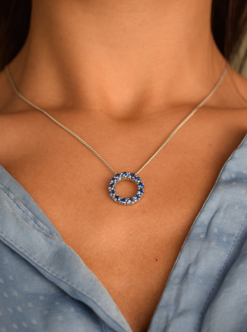 blue sapphire circle of life pendant